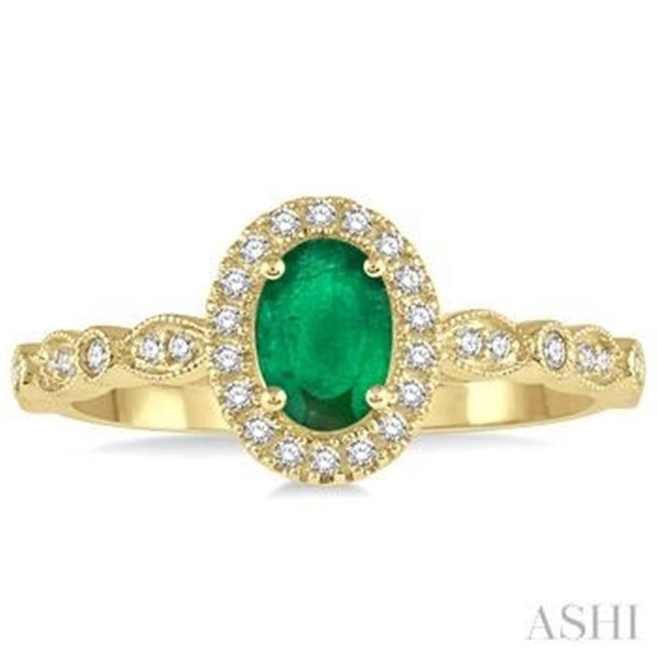 Halo Style Engagement Ring with Colored Stone Center 10 KT Yellow with an Oval Shape Emerald Center Stone and Diamonds accent stones