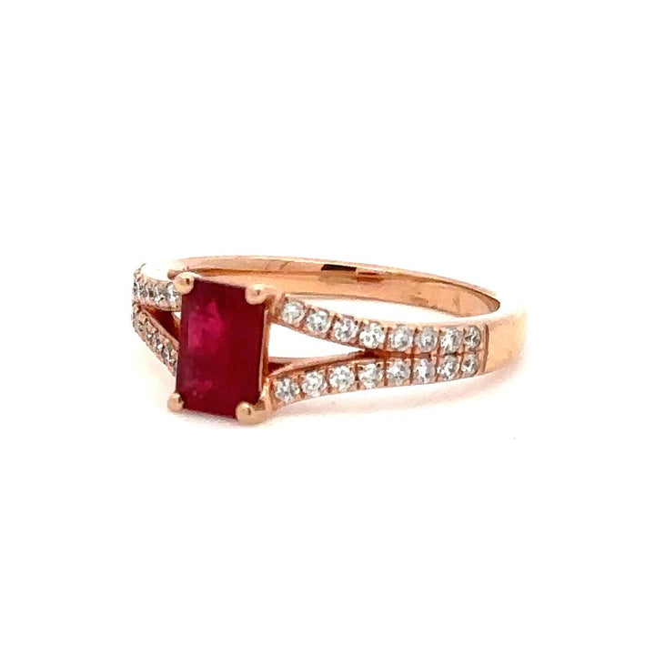 Solitare Accent Style Engagement Ring with Colored Stone Center 14 KT Rose with an Emerald Cut Shape Ruby Center Stone and Diamonds accent stones