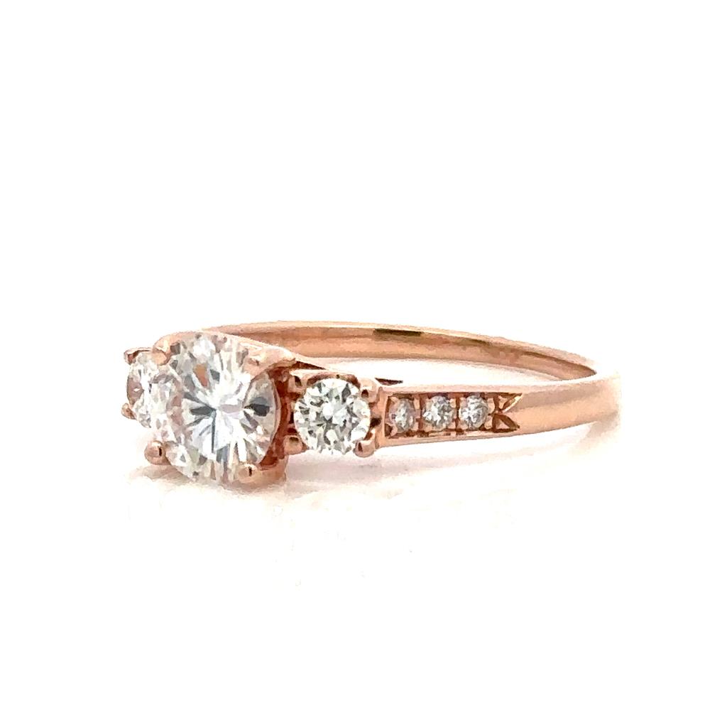 Solitare Style Engagement Ring with Colored Stone Center 14 KT Rose with an R Shape Moissanite Center Stone and Diamond accent stones