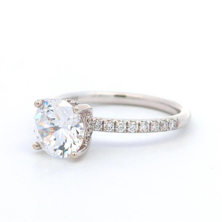 Solitare Accent Style Diamond Engagement Ring 18 KT White 
(Center Stone Not Included)