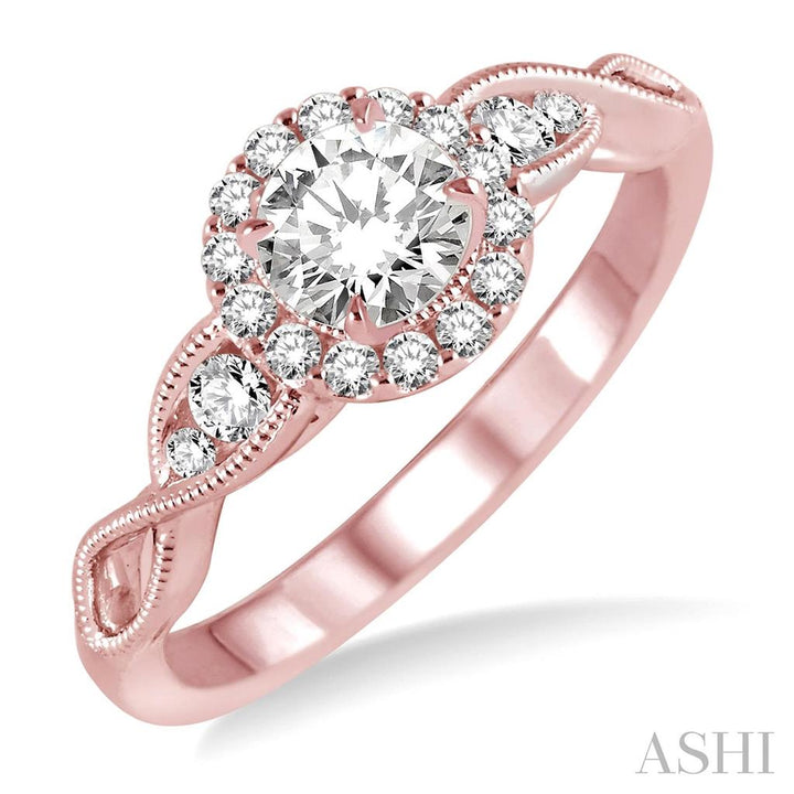 Halo Style Diamond Engagement Ring 14 KT Rose 
(Center Stone Not Included)