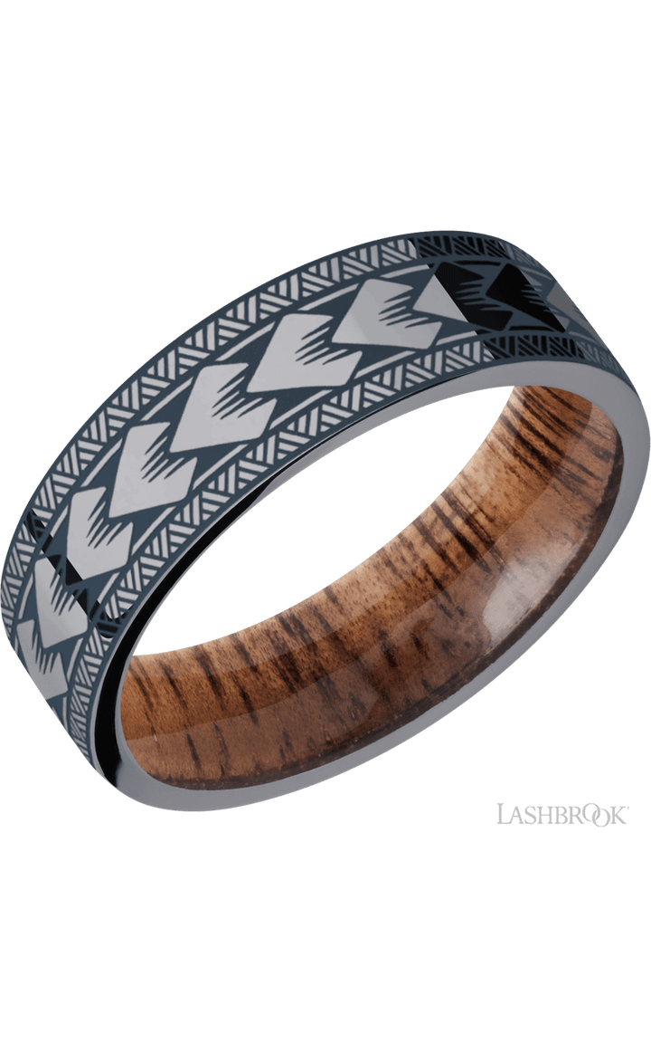 7 mm wide/Flat/Tantalum band with a laser carved Maori pattern also featuring a Koa sleeve.