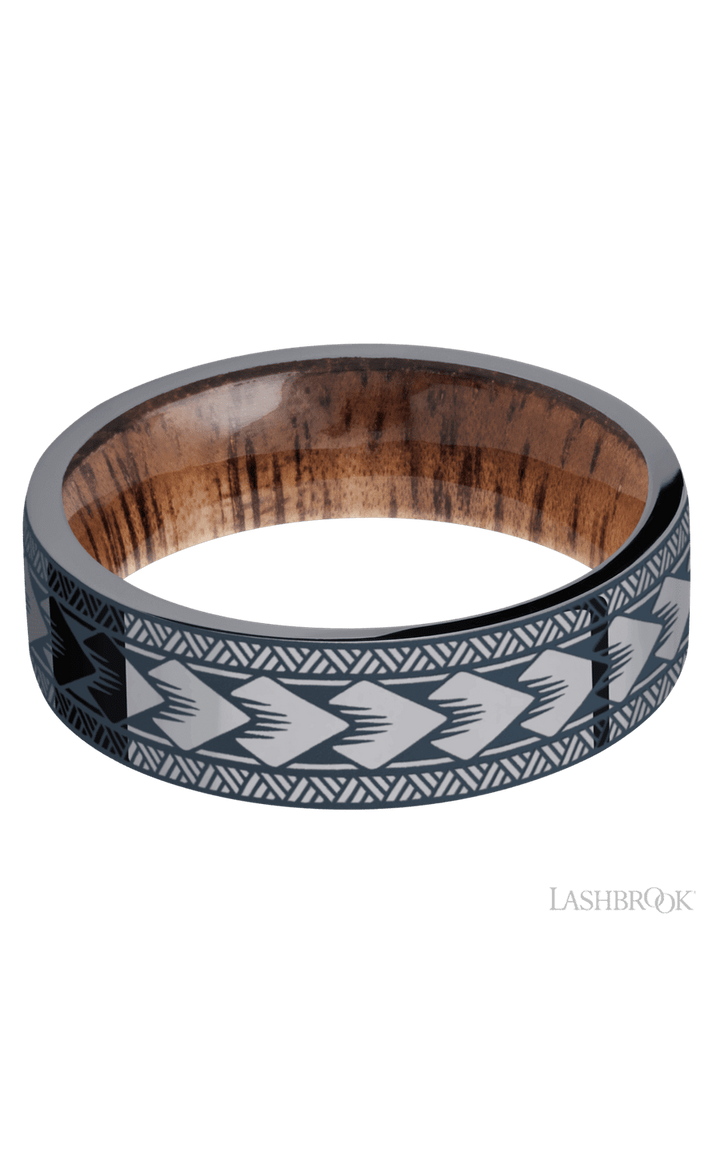 7 mm wide/Flat/Tantalum band with a laser carved Maori pattern also featuring a Koa sleeve.