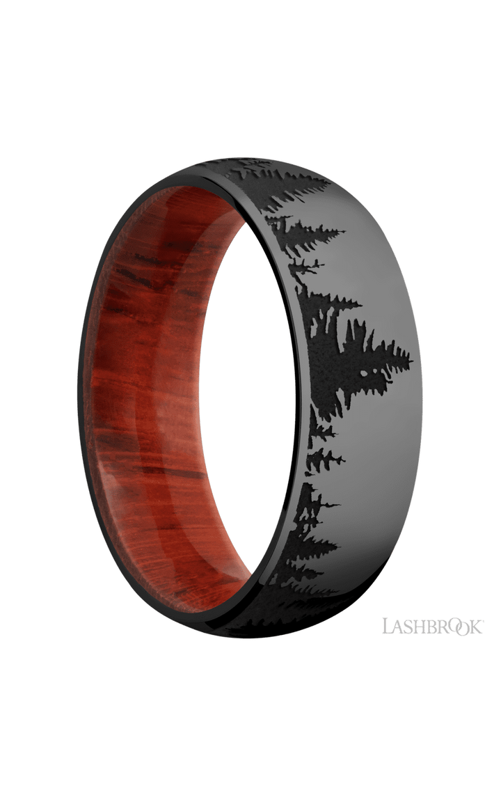 7 mm wide/Domed/Zirconium band with a laser carved Trees pattern also featuring a Padauk sleeve.