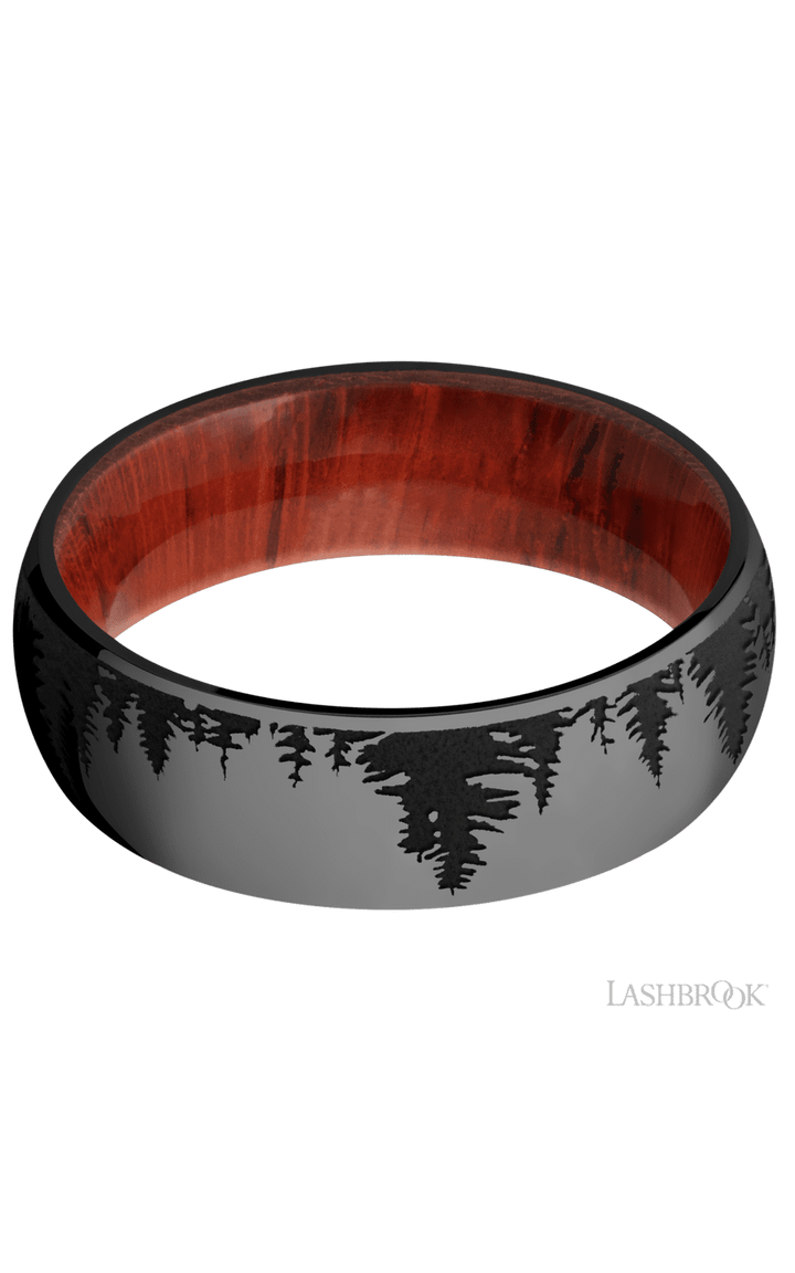 7 mm wide/Domed/Zirconium band with a laser carved Trees pattern also featuring a Padauk sleeve.