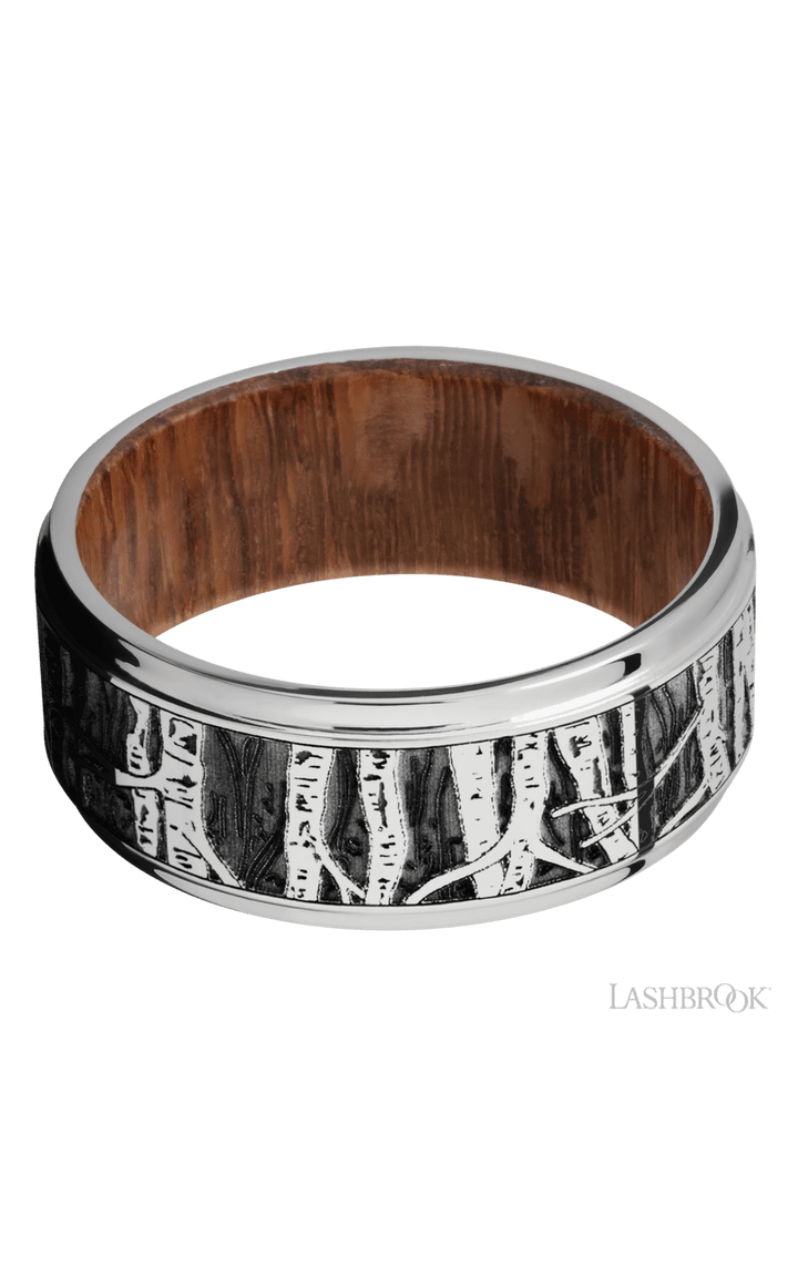 9 mm wide/Flat Grooved Edges/Cobalt Chrome band with a laser carved Aspen pattern also featuring a Leopard Wood sleeve.