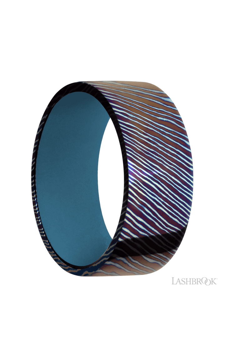 9 mm wide Flat Titanium Damascus band featuring a Royal Blue sleeve.