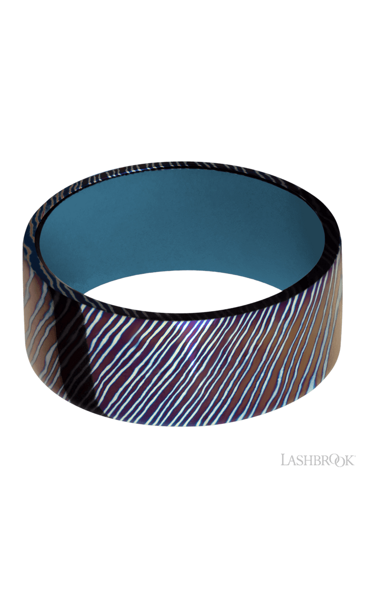 9 mm wide Flat Titanium Damascus band featuring a Royal Blue sleeve.