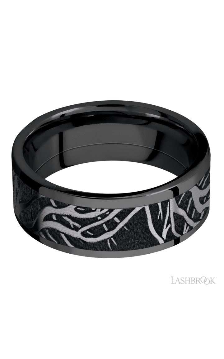 8 mm wide/Flat/Zirconium band with one 6 mm Centered inlay of Tantalum with a laser carved Branches pattern.