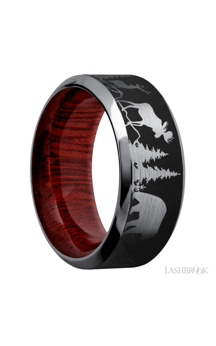 9 mm wide/High Bevel/Tantalum band with a laser carved Bear Moose Deer Mountain pattern also featuring a Blood Wood sleeve.