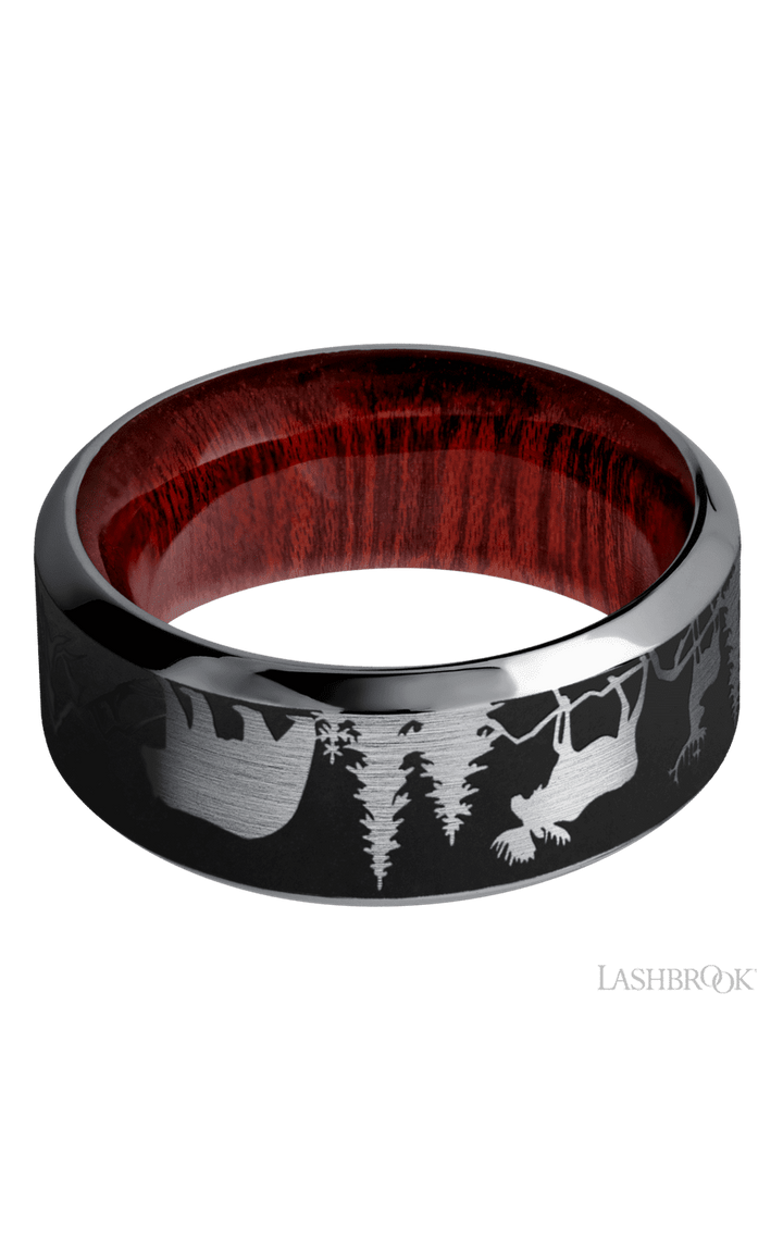 9 mm wide/High Bevel/Tantalum band with a laser carved Bear Moose Deer Mountain pattern also featuring a Blood Wood sleeve.