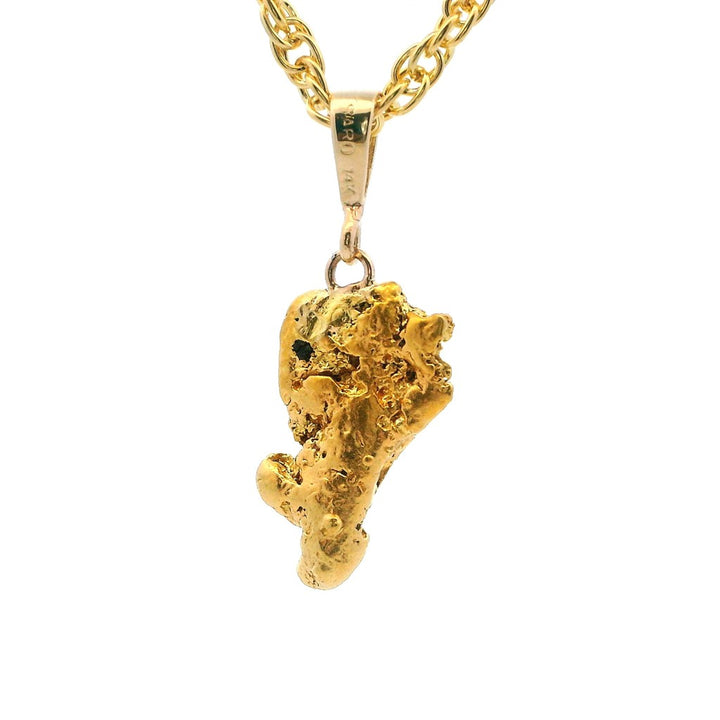 Alaskan Gold Nugget Necklace Indian Drop 1.09 " long On a Base Metal Yellow Display Chain