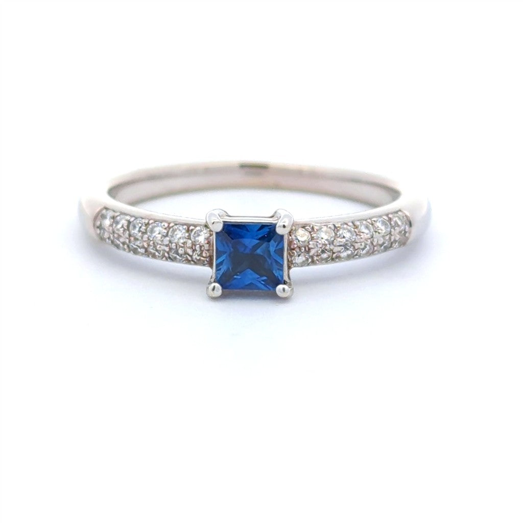 1/3 Carat Solitare Accent Style Engagement Ring White 14 Karat Gold With A Sapphire Center Stone And Diamonds Accent Stones
